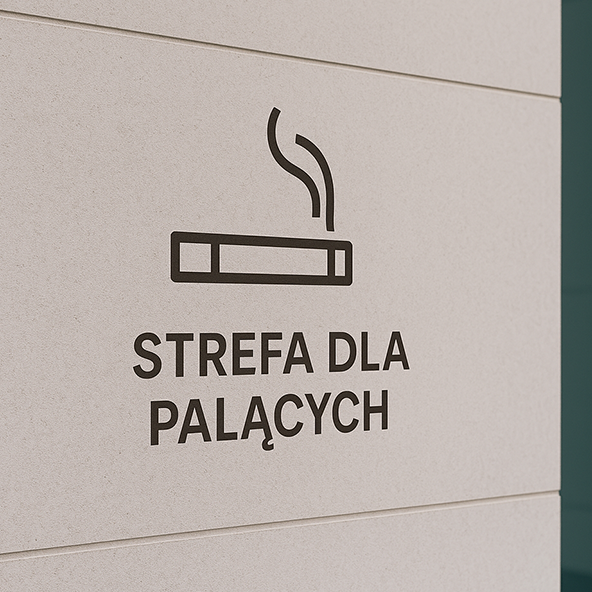 znak strefa dla palących na ścianie